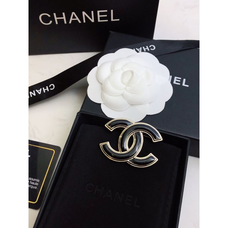 Ch*el brooches
